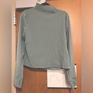 Turquoise FLX Long Sleeve Athletic Top with Crossed Open Back in size XL